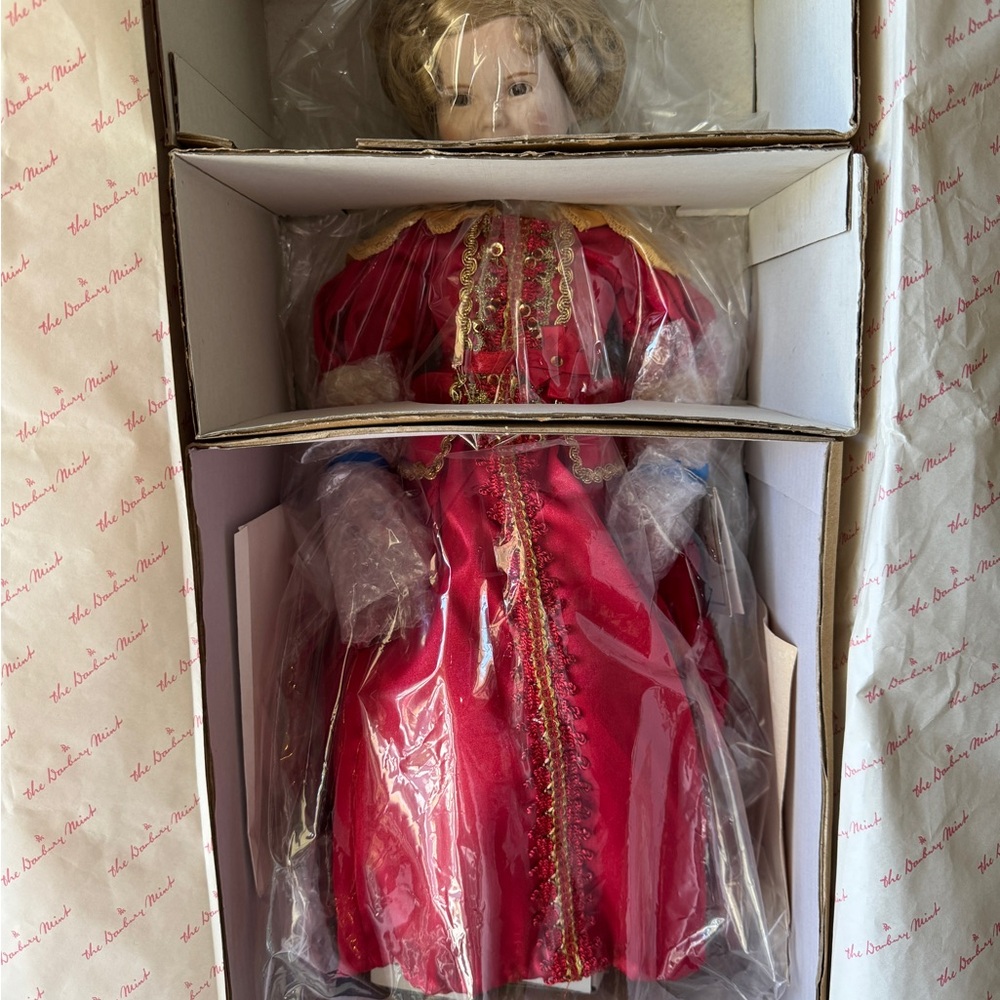 Elegant Red Porcelain Doll